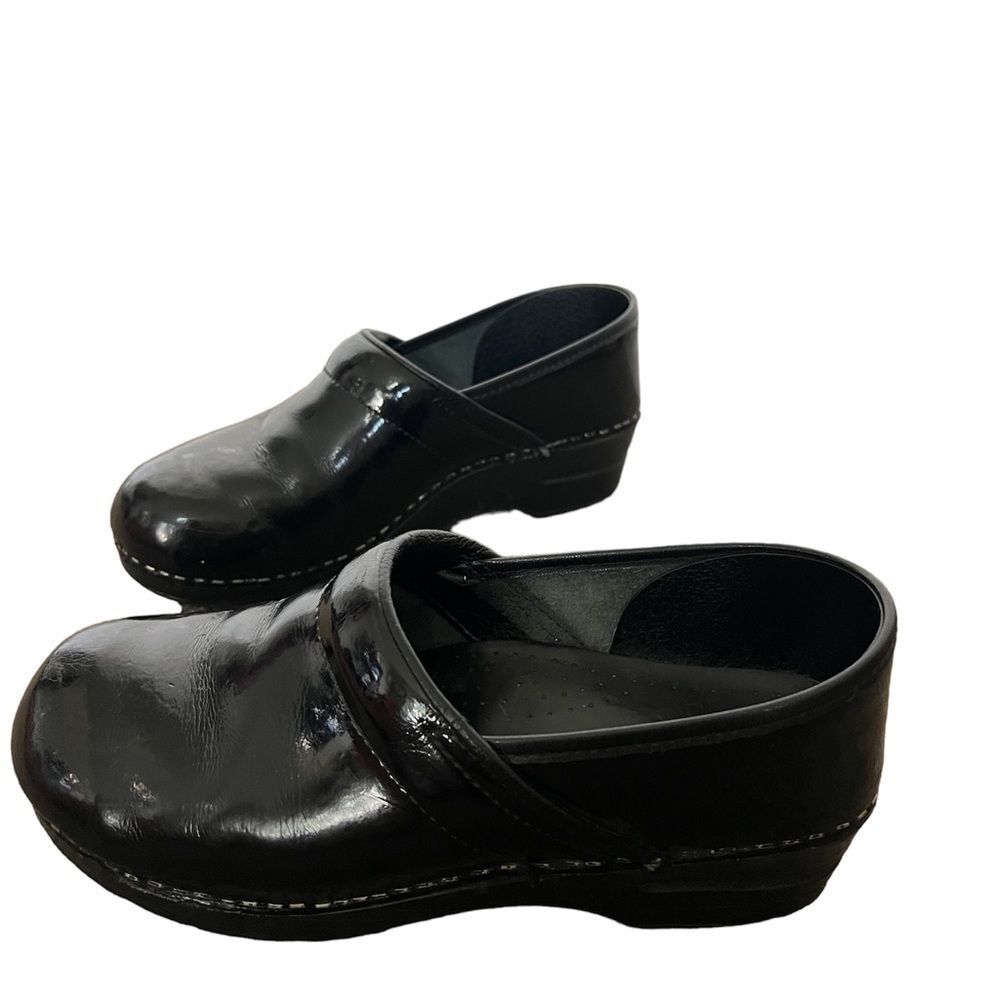 Dansko black patent clogs